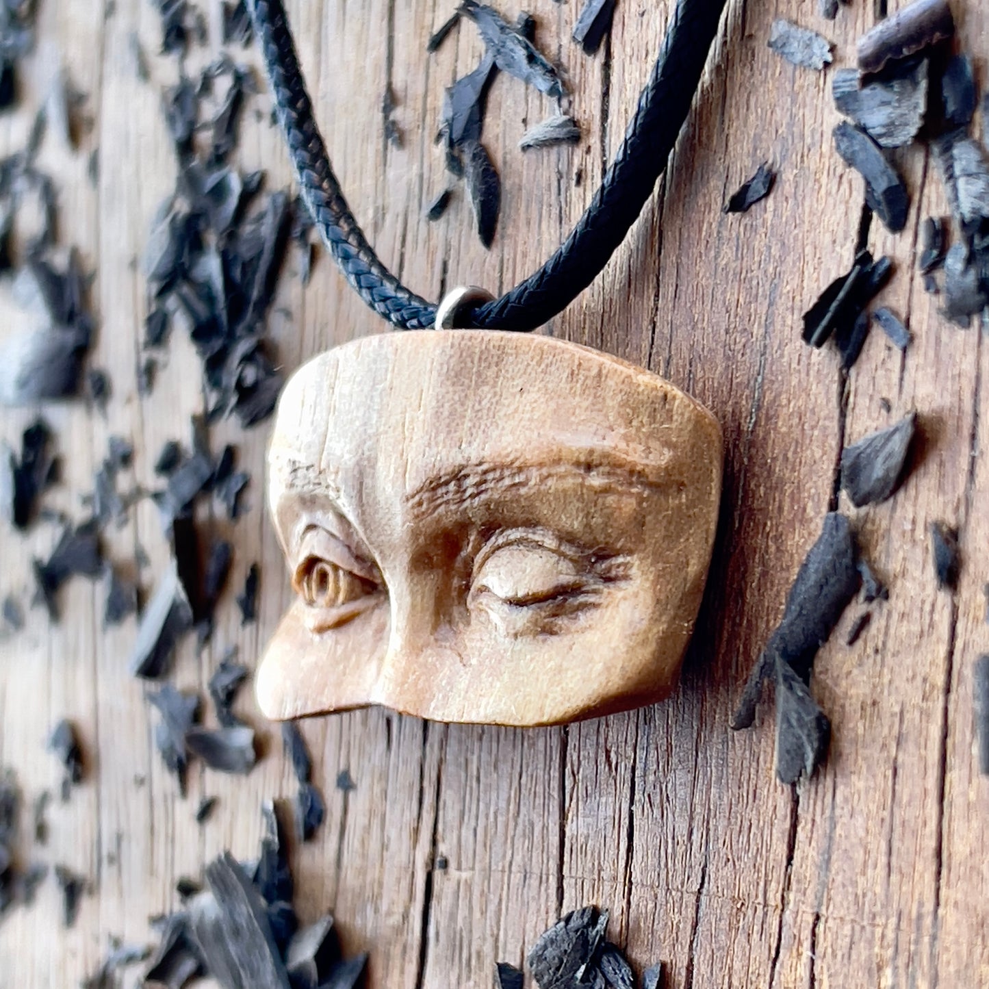 Winking Eyes Walnut Wood Pendant
