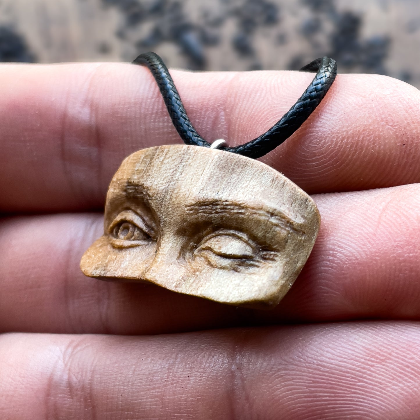 Winking Eyes Walnut Wood Pendant