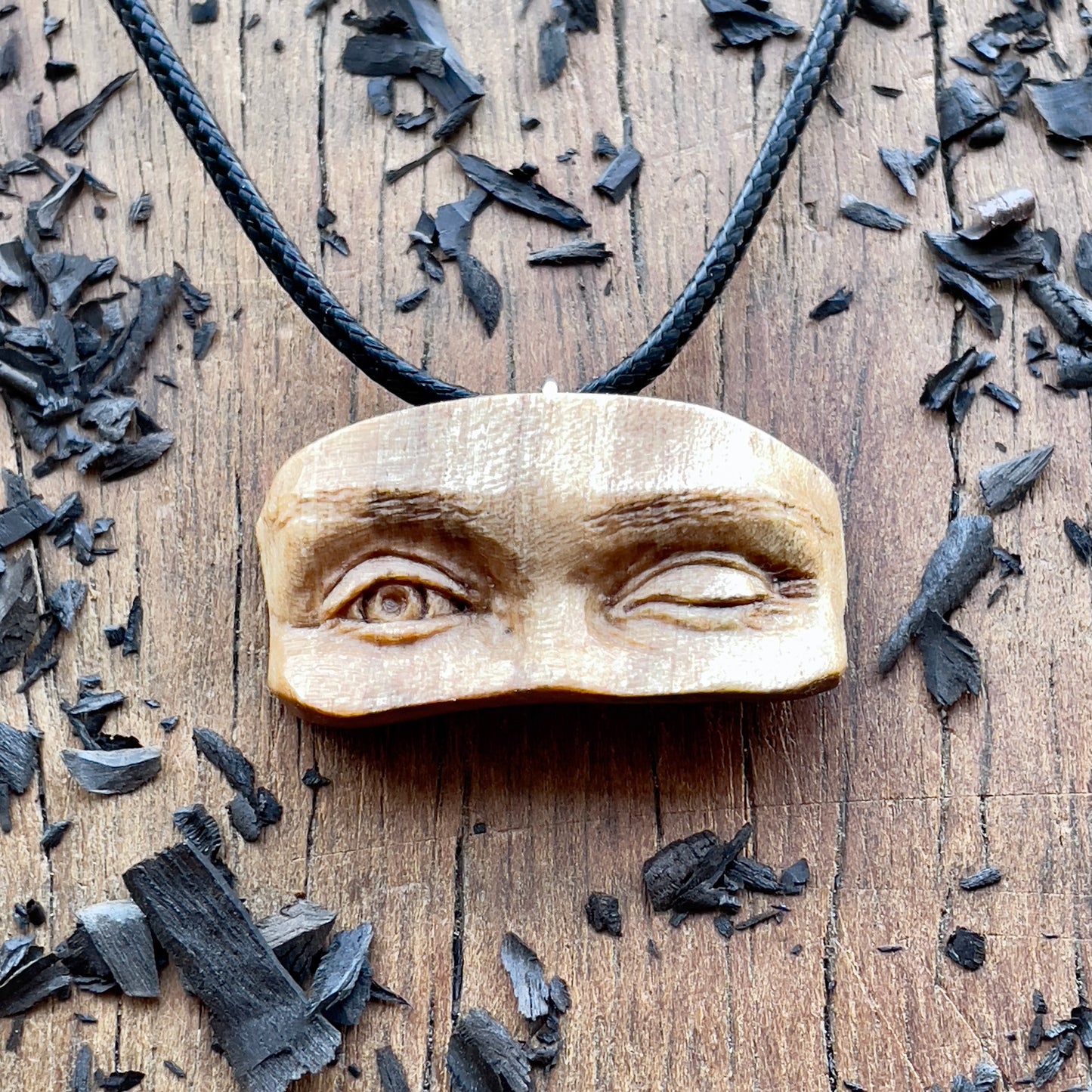 Winking Eyes Walnut Wood Pendant