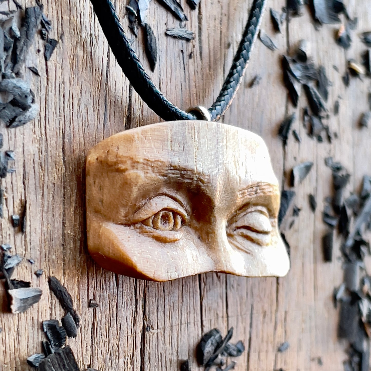 Winking Eyes Walnut Wood Pendant