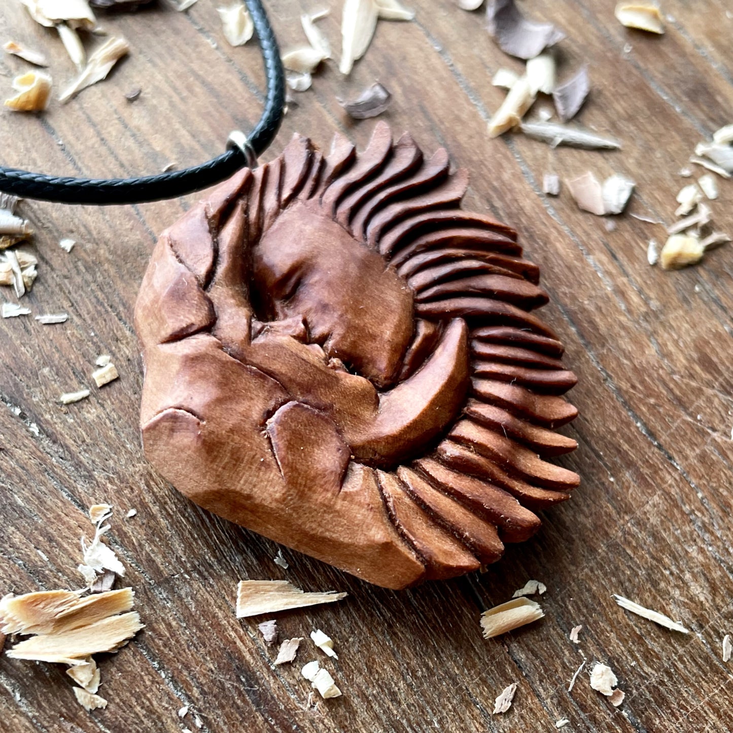 “Sun and Moon Kiss” Apricot Wood Pendant