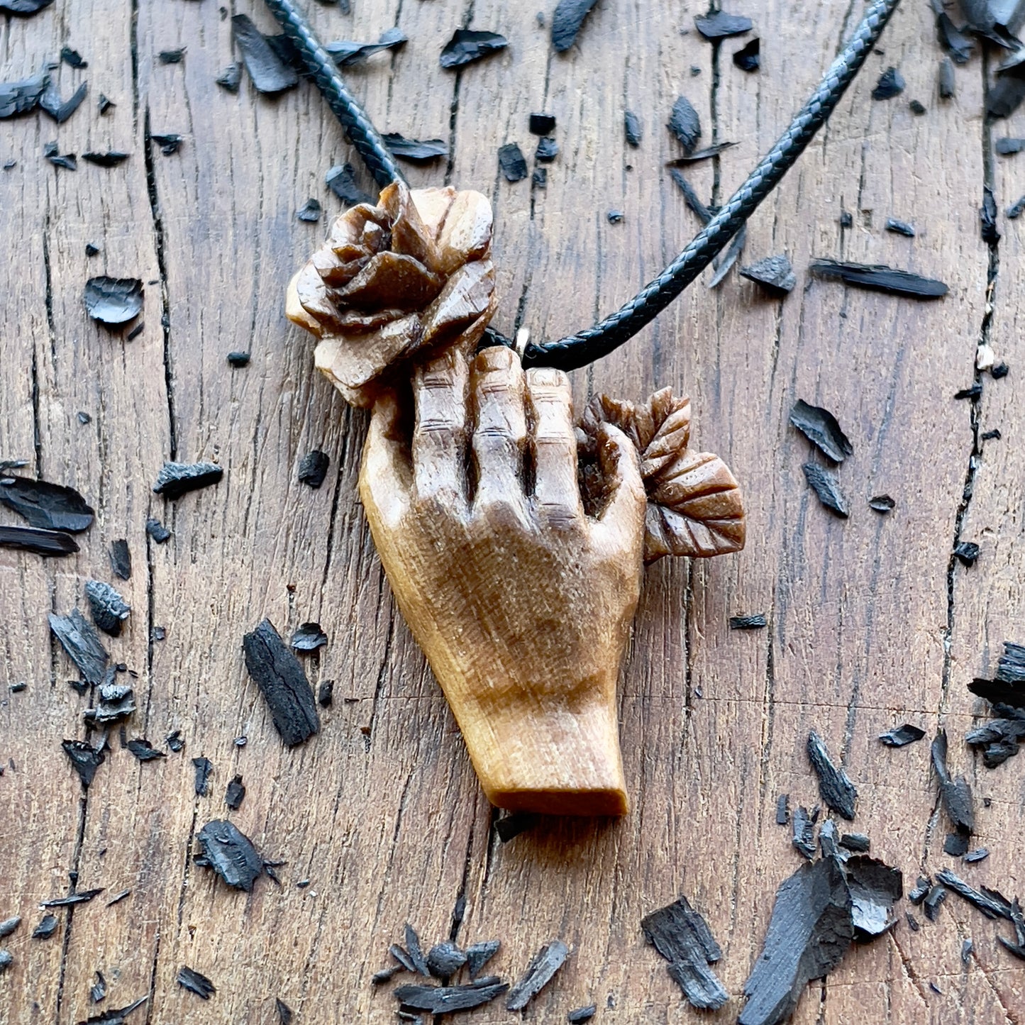 Hand With Rose Walnut Wood Pendant