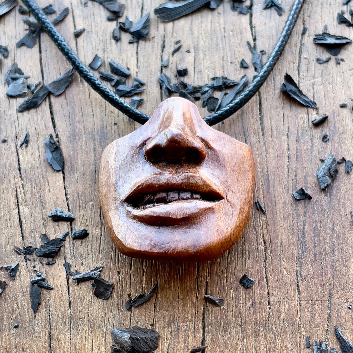 Biting Lips Pendant