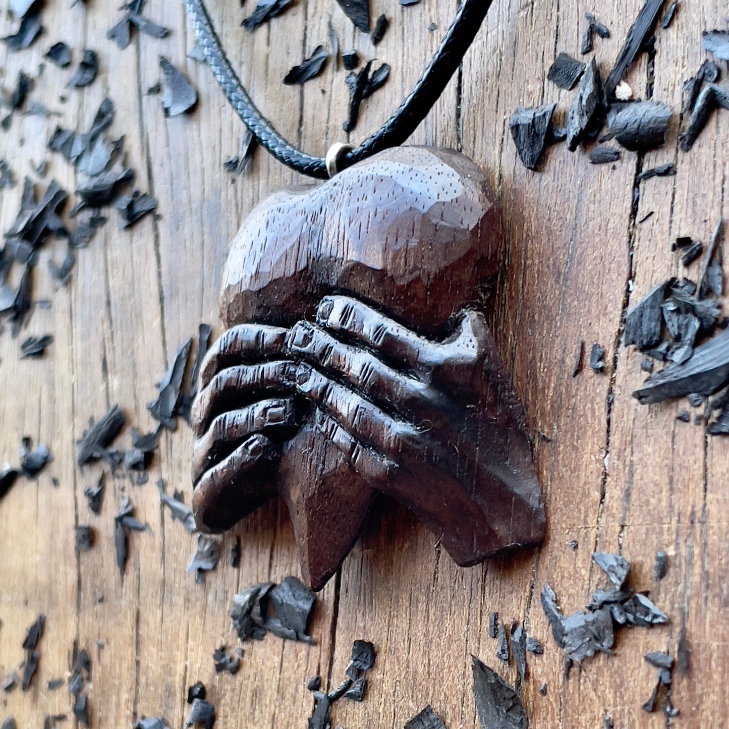 “Hands Squeezing Heart” Walnut Wood Pendant