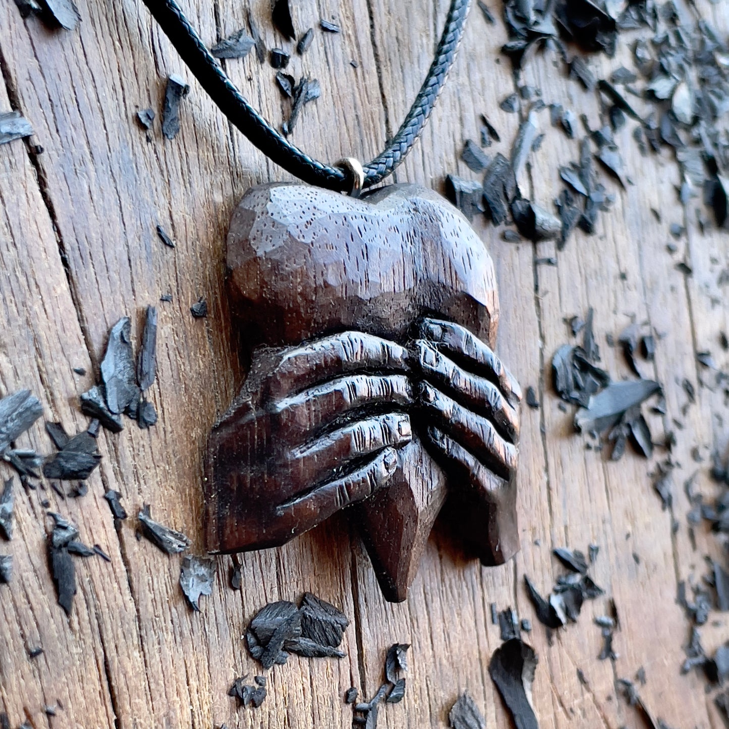 “Hands Squeezing Heart” Walnut Wood Pendant