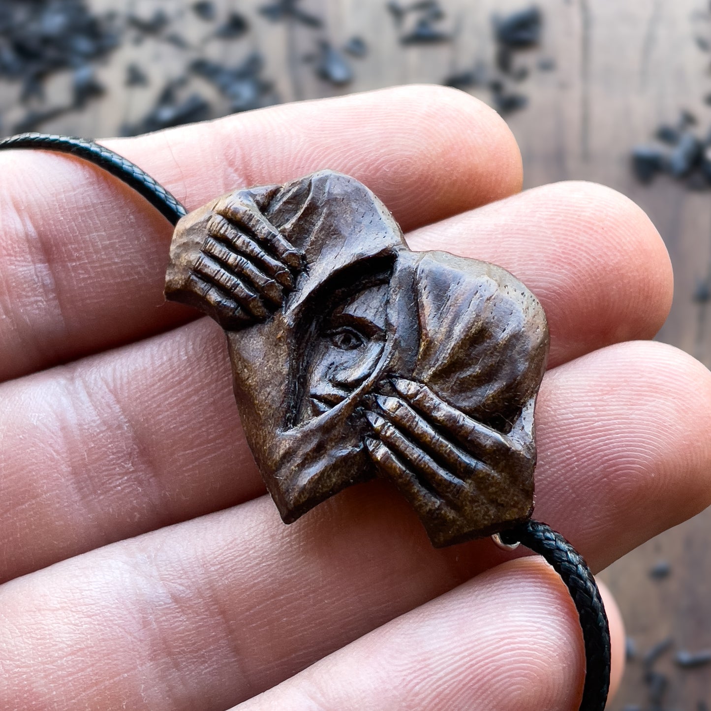 Hands Opening Heart With Face Pendant