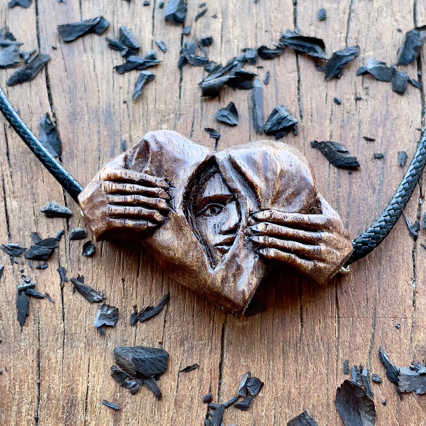 Hands Opening Heart With Face Pendant