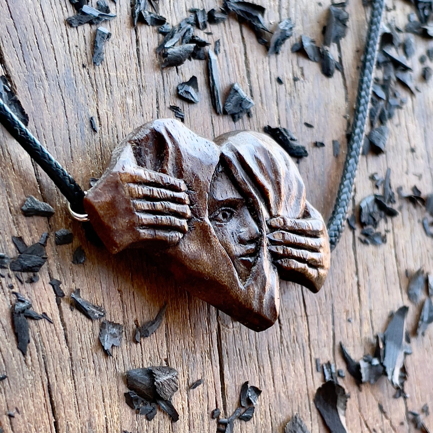 Hands Opening Heart With Face Pendant