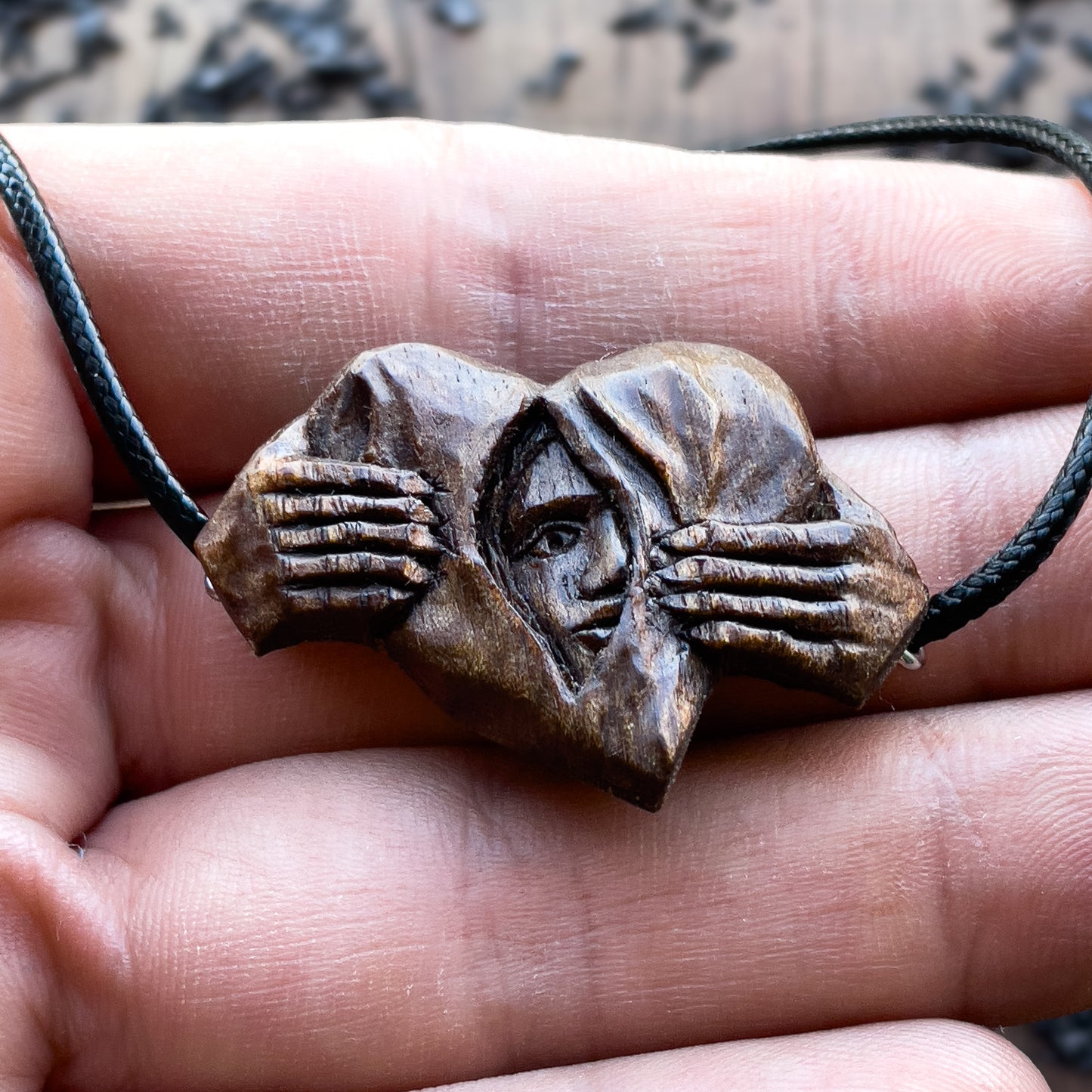 Hands Opening Heart With Face Pendant