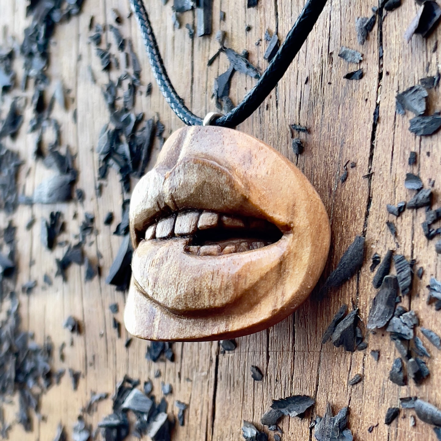Biting Lips Walnut Wood Pendant