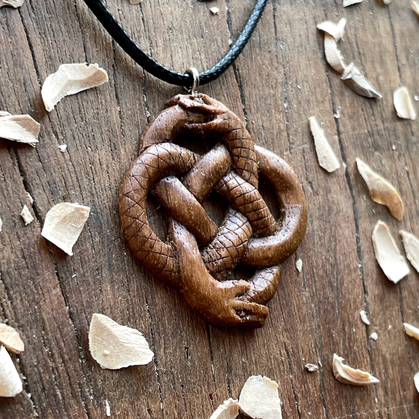 Double Ouroboros Pendant – Celtic Knot