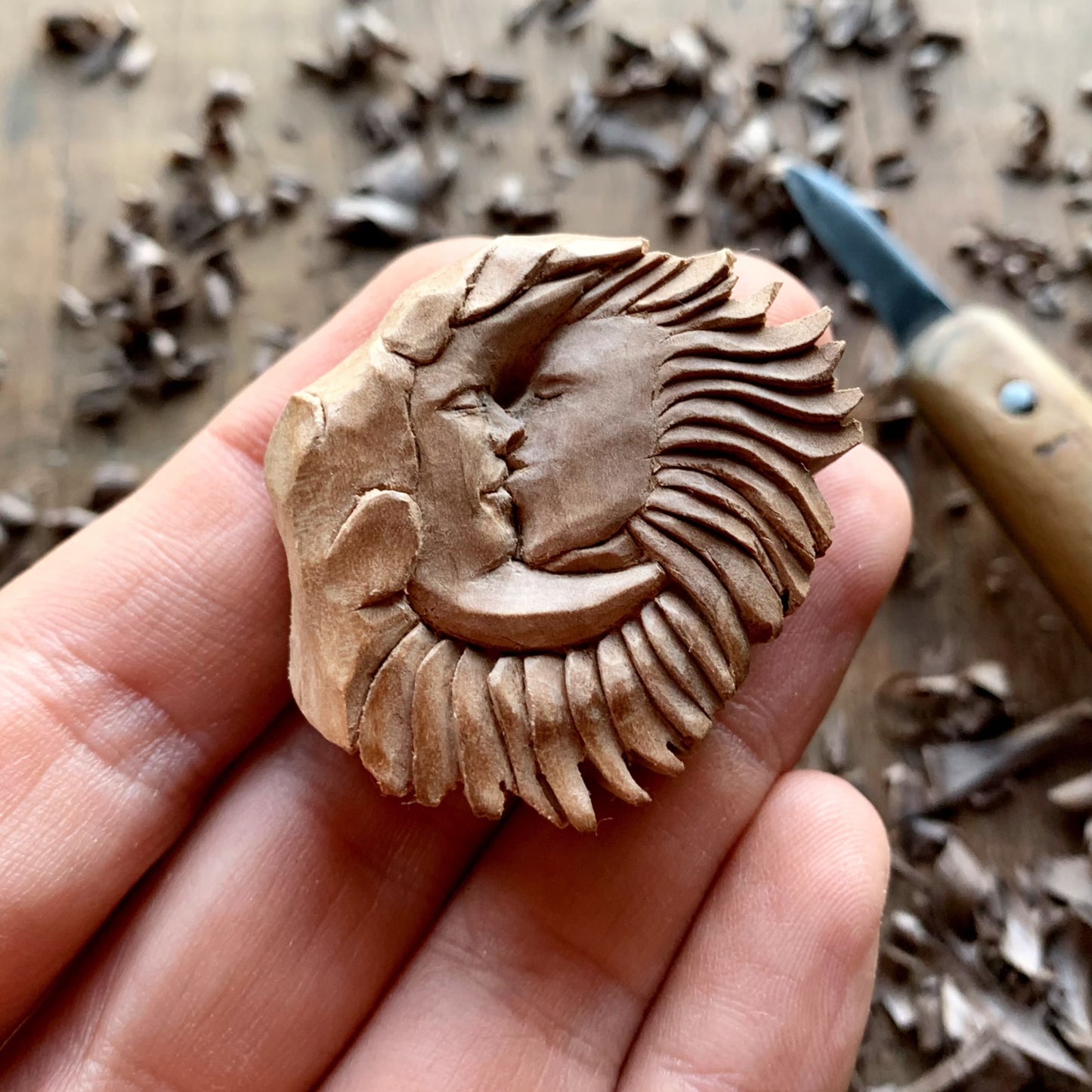 “Sun and Moon Kiss” Apricot Wood Pendant