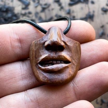 Biting Lips Pendant