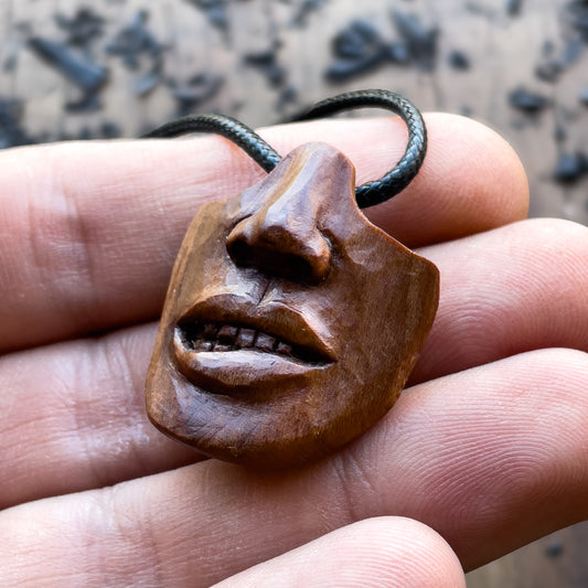 Biting Lips Pendant
