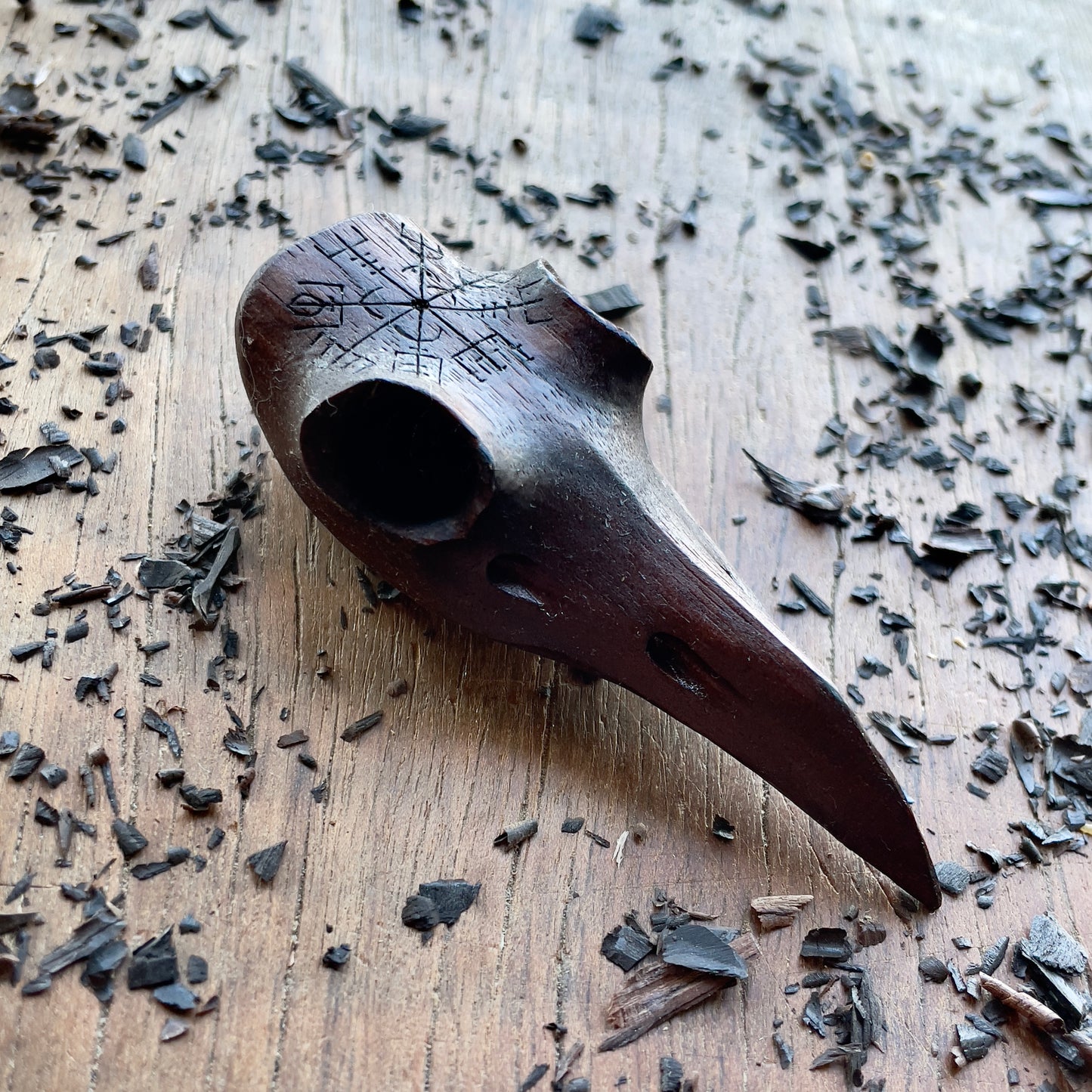 Raven skull wood sculpture