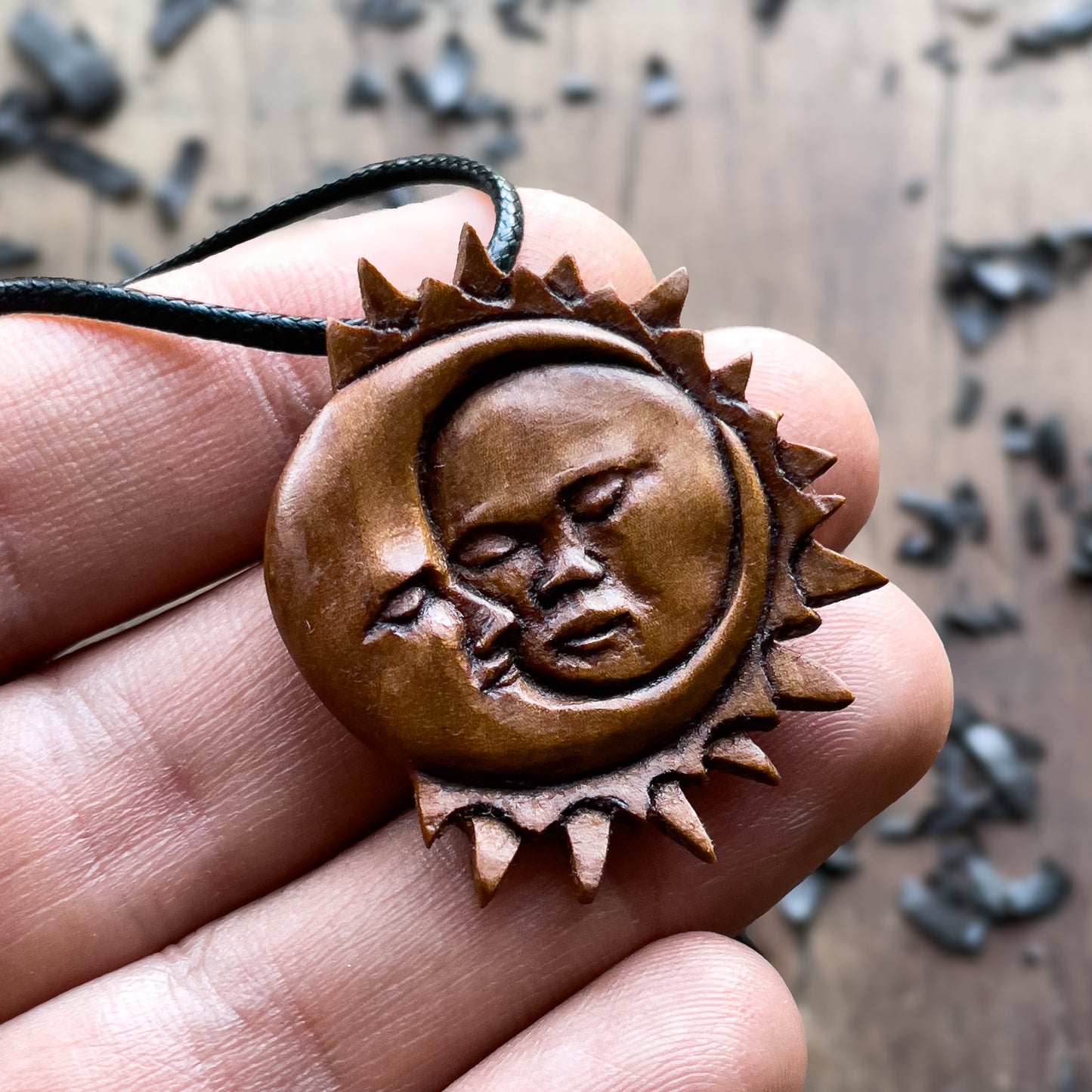 Sun And Moon Face Apricot Wood Pendant