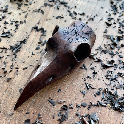 Raven skull wood sculpture