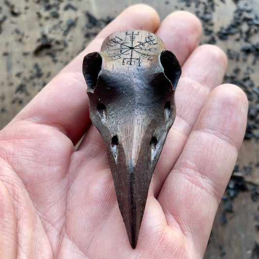Raven skull wood sculpture