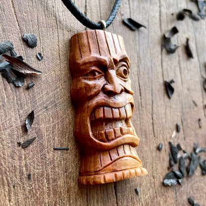Winking Tiki Mask Plum Wood Pendant