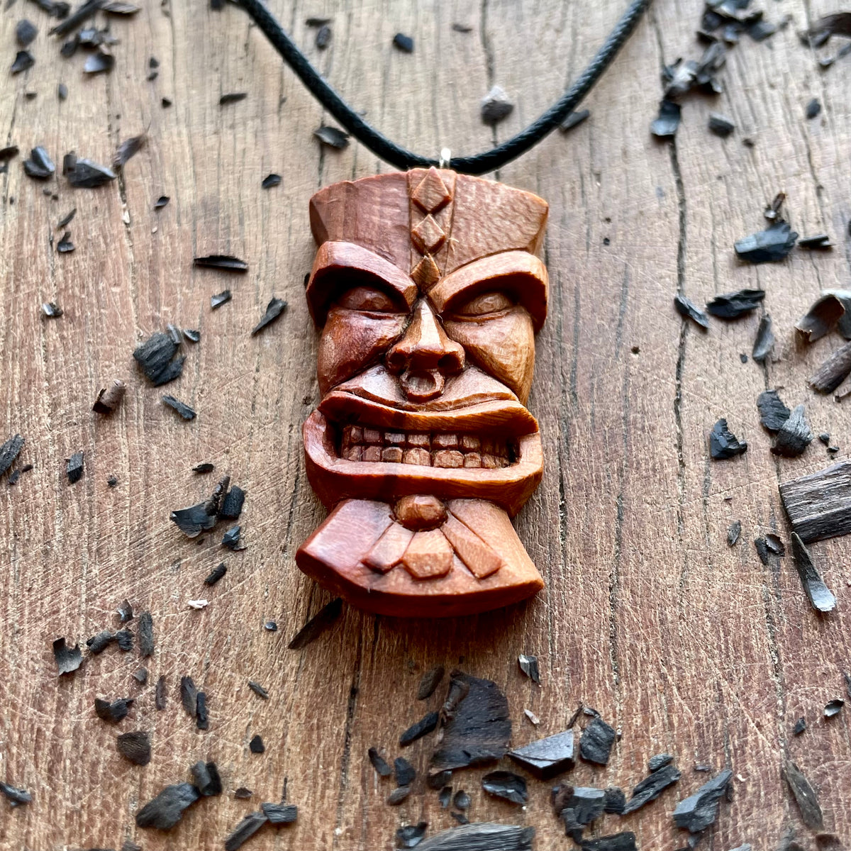Tiki Plum Wood Pendant