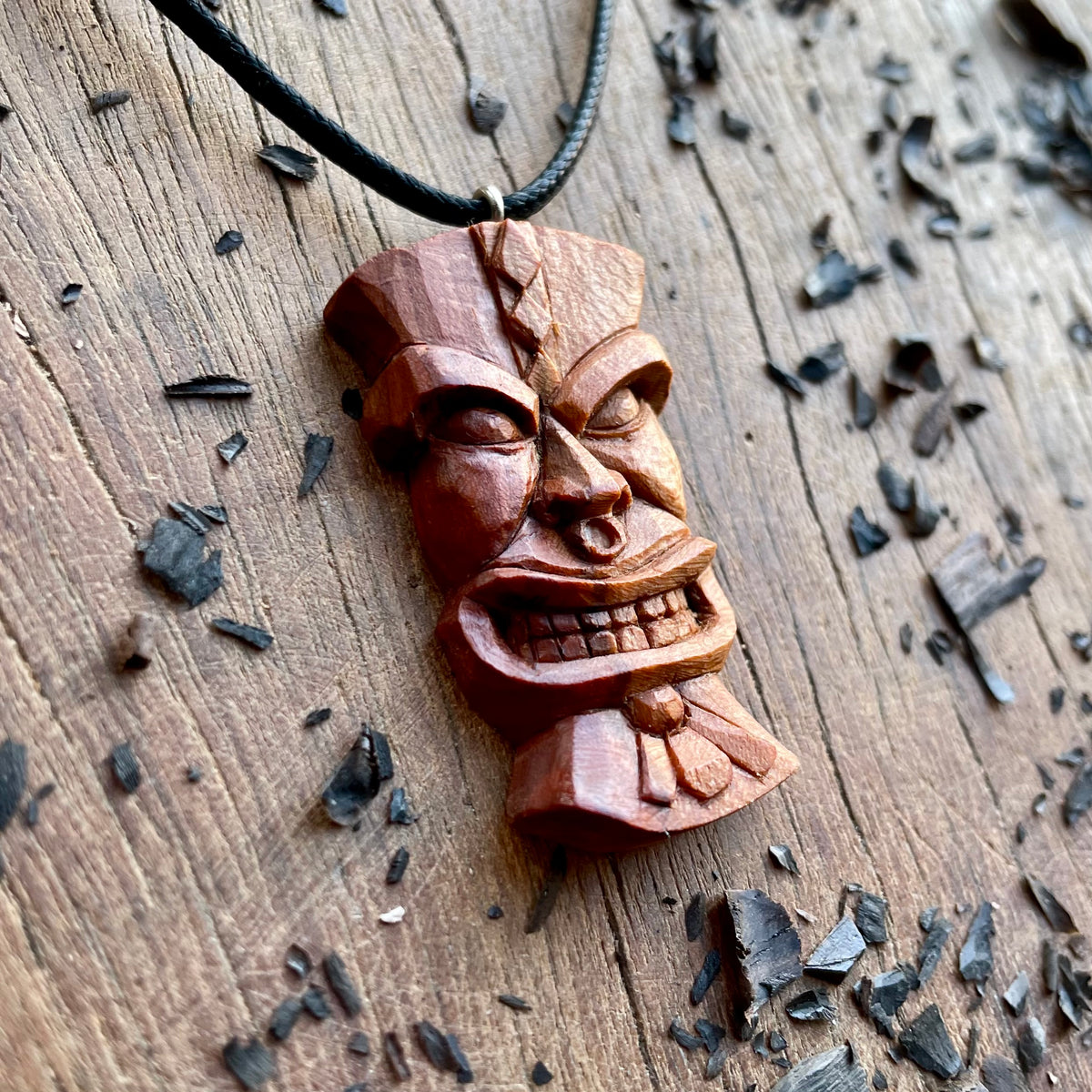 Tiki Plum Wood Pendant