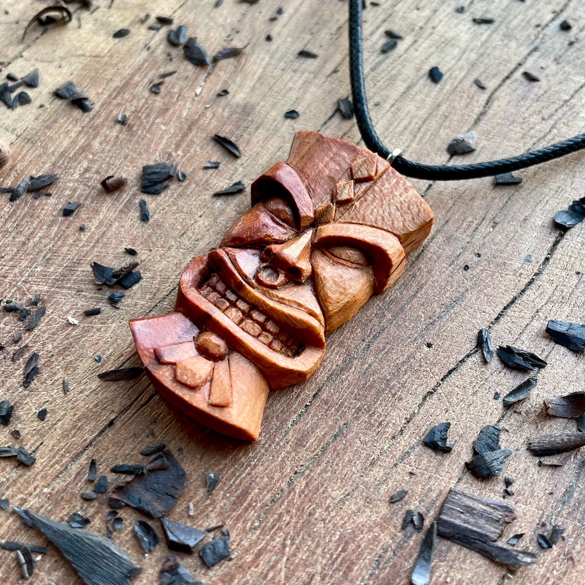 Tiki Plum Wood Pendant