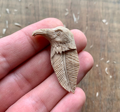 Raven Head_Feather Walnut Wood Pendant