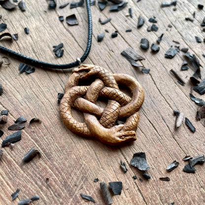 Double Ouroboros Pendant – Celtic Knot