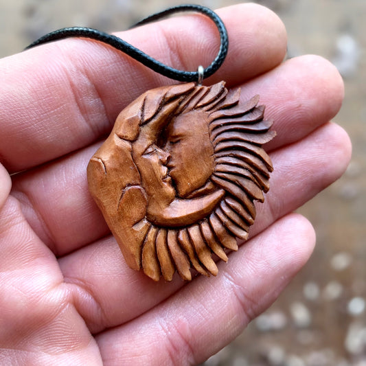 “Sun and Moon Kiss” Apricot Wood Pendant