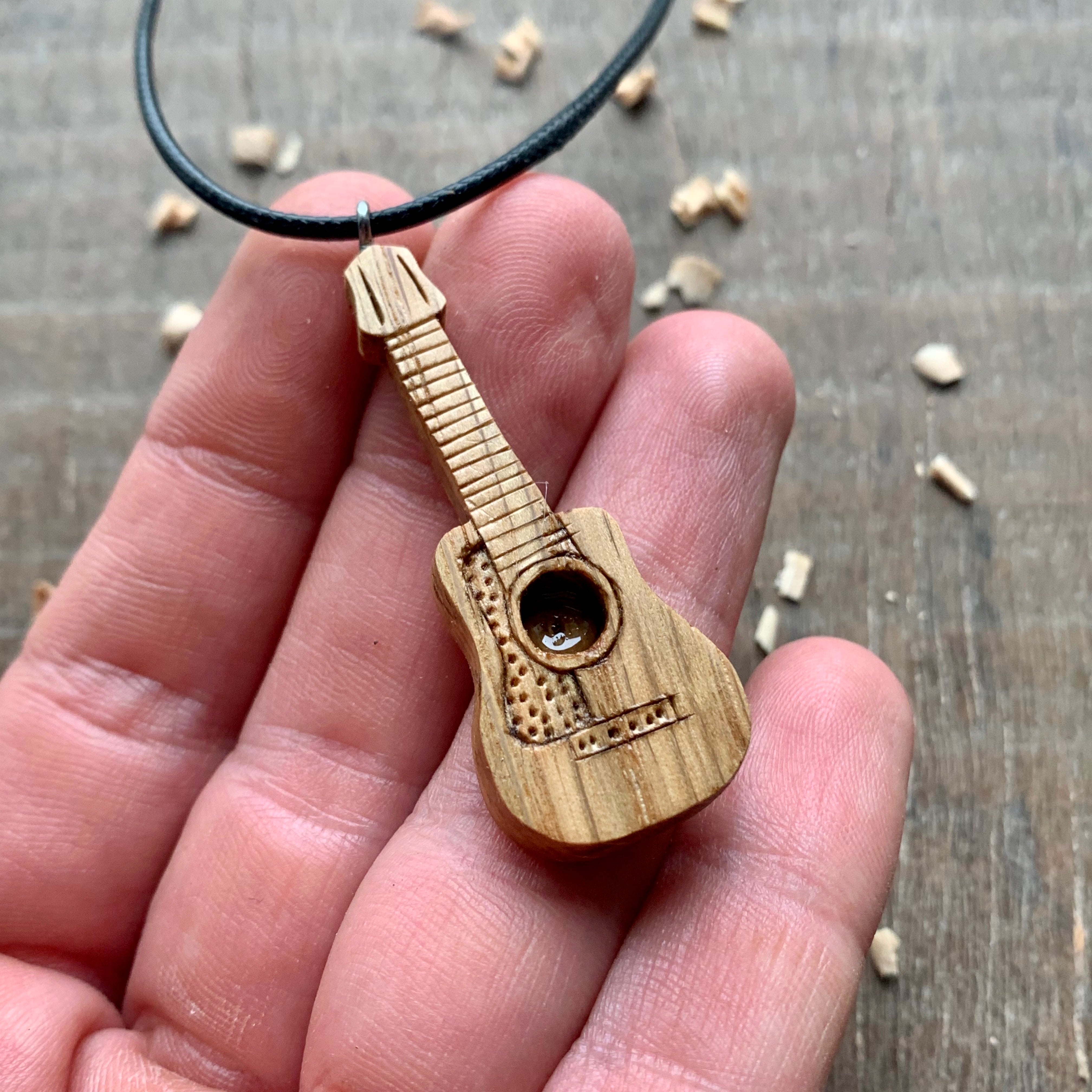 Guitar pendant store