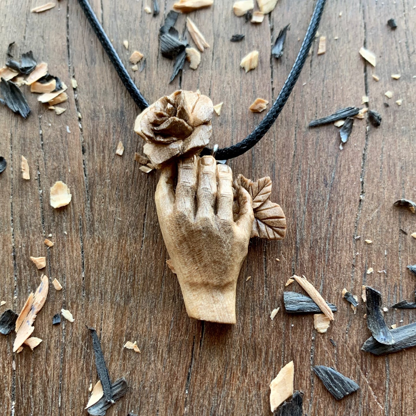 Hand With Rose Walnut Wood Pendant