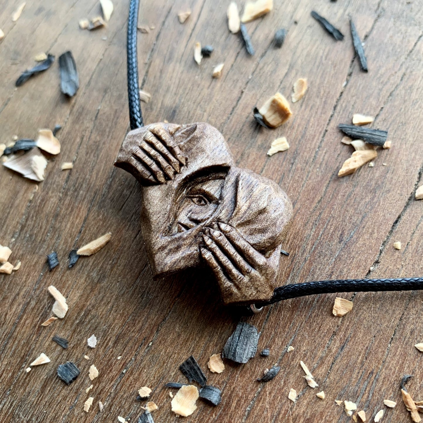 Hands Opening Heart With Face Pendant