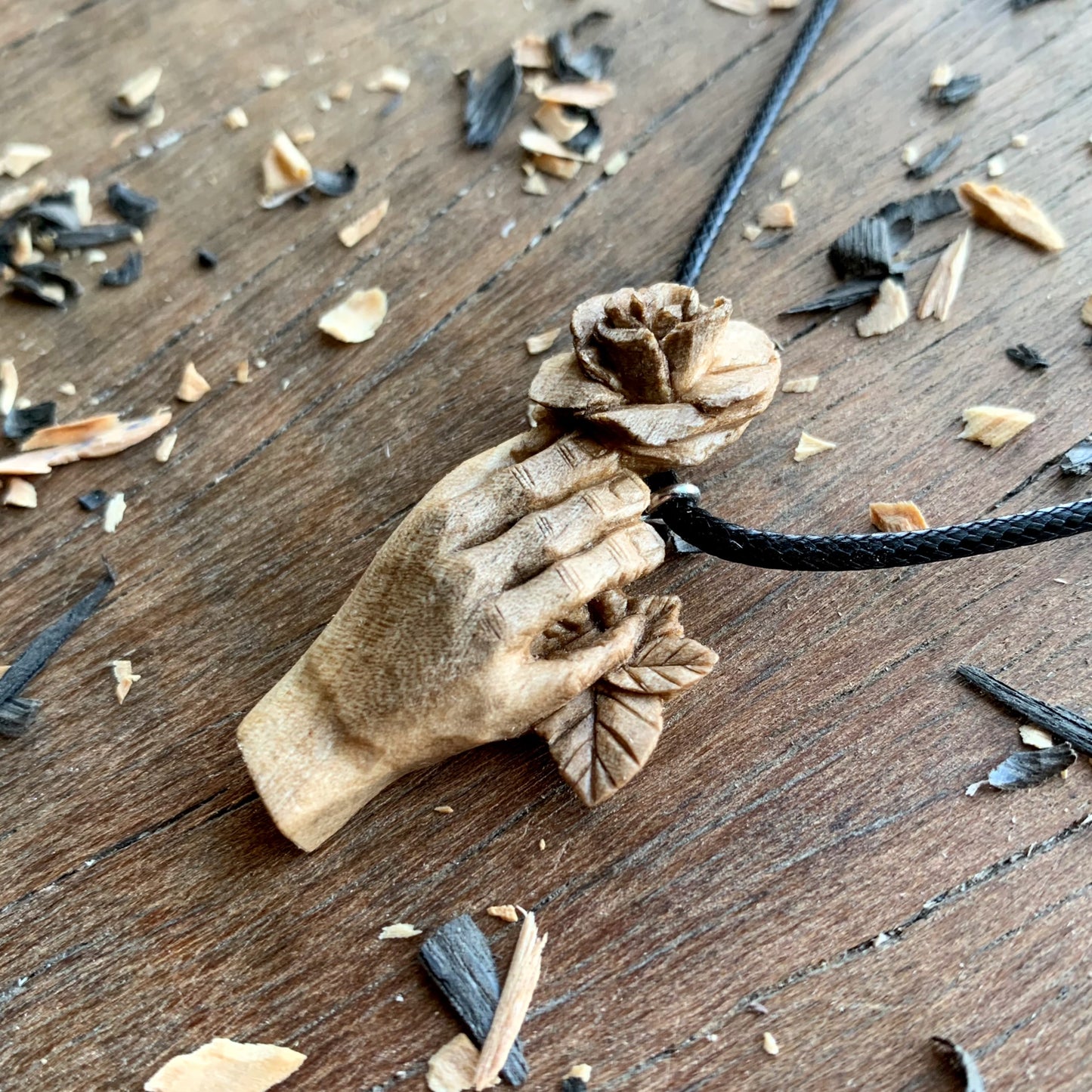 Hand With Rose Walnut Wood Pendant