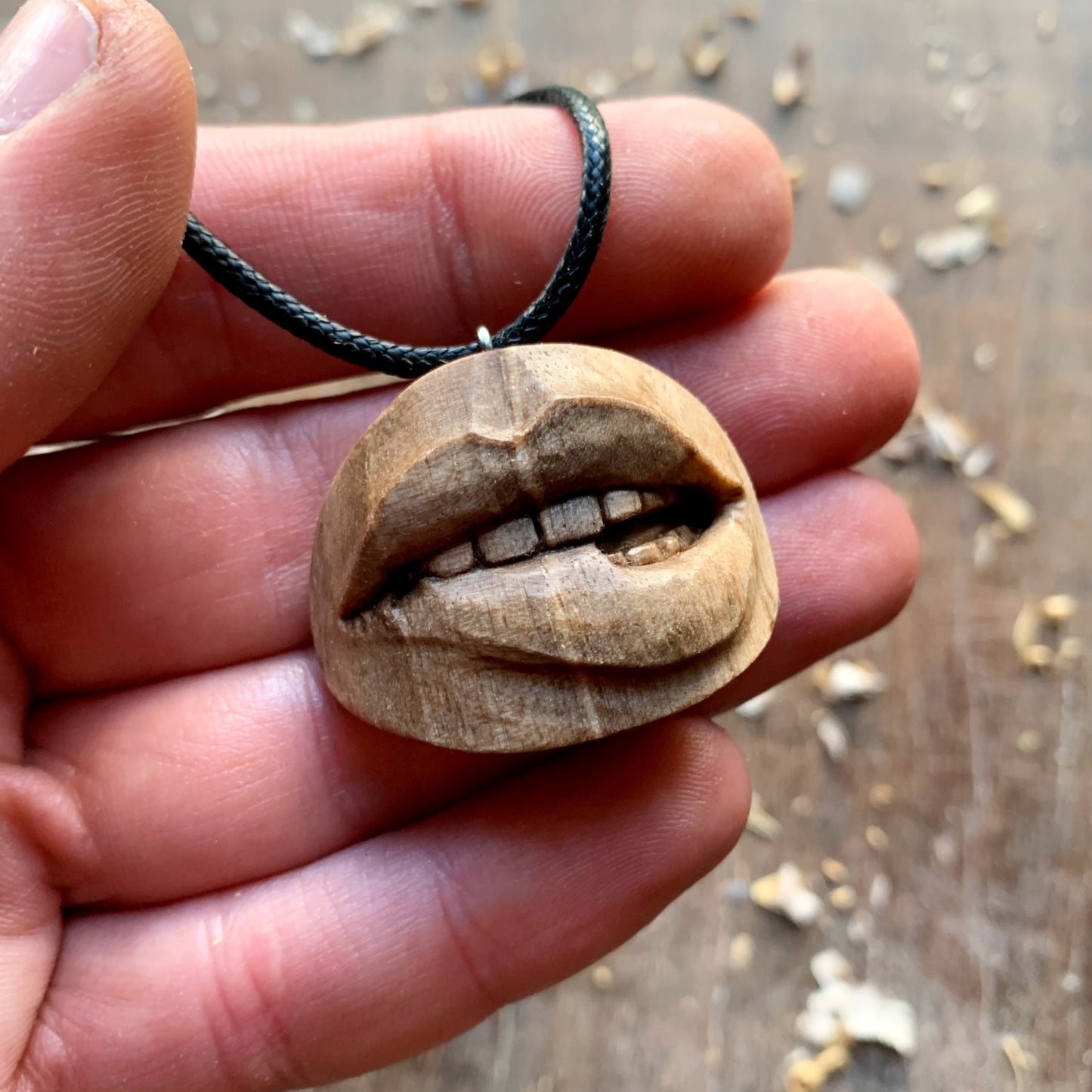 Biting Lips Walnut Wood Pendant