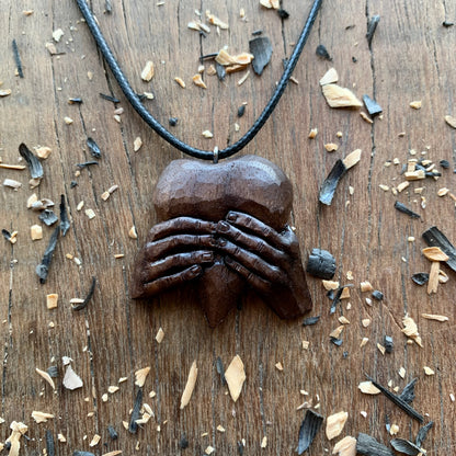 “Hands Squeezing Heart” Walnut Wood Pendant