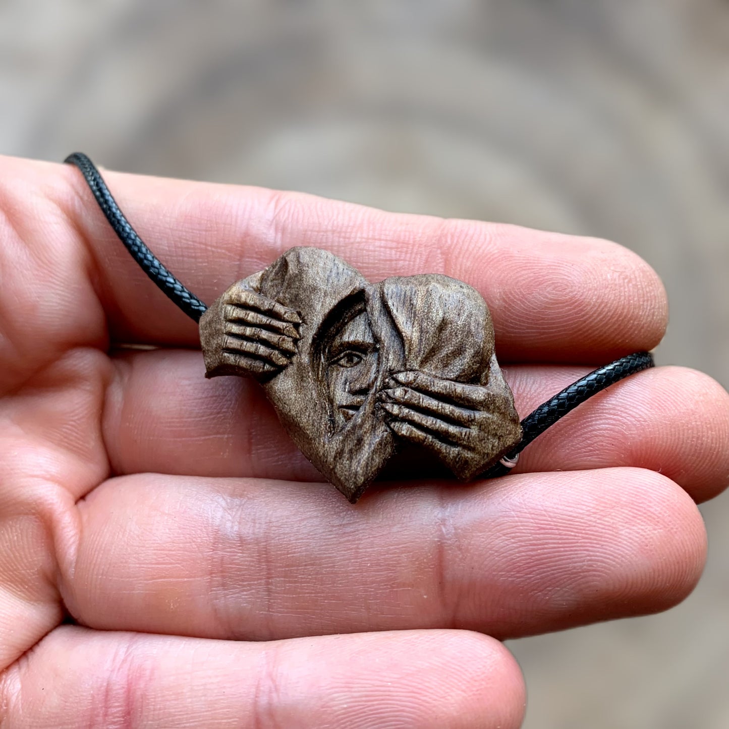 Hands Opening Heart With Face Pendant