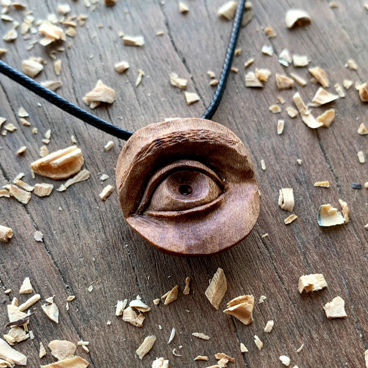 Realistic Eye Plum Wood Pendant