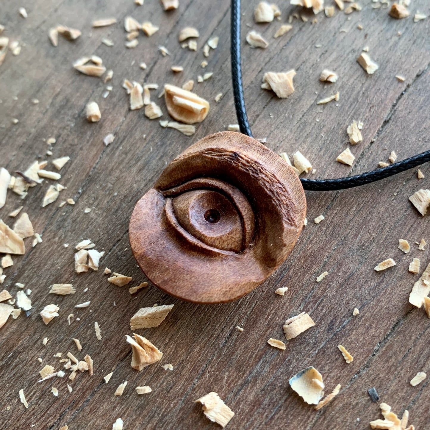 Realistic Eye Plum Wood Pendant