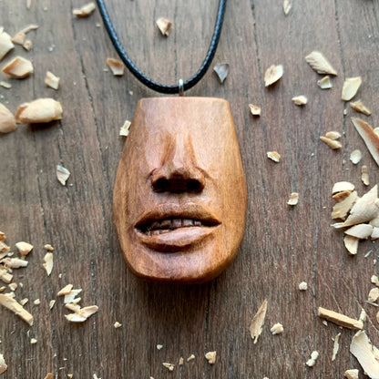 Biting Lips Pendant