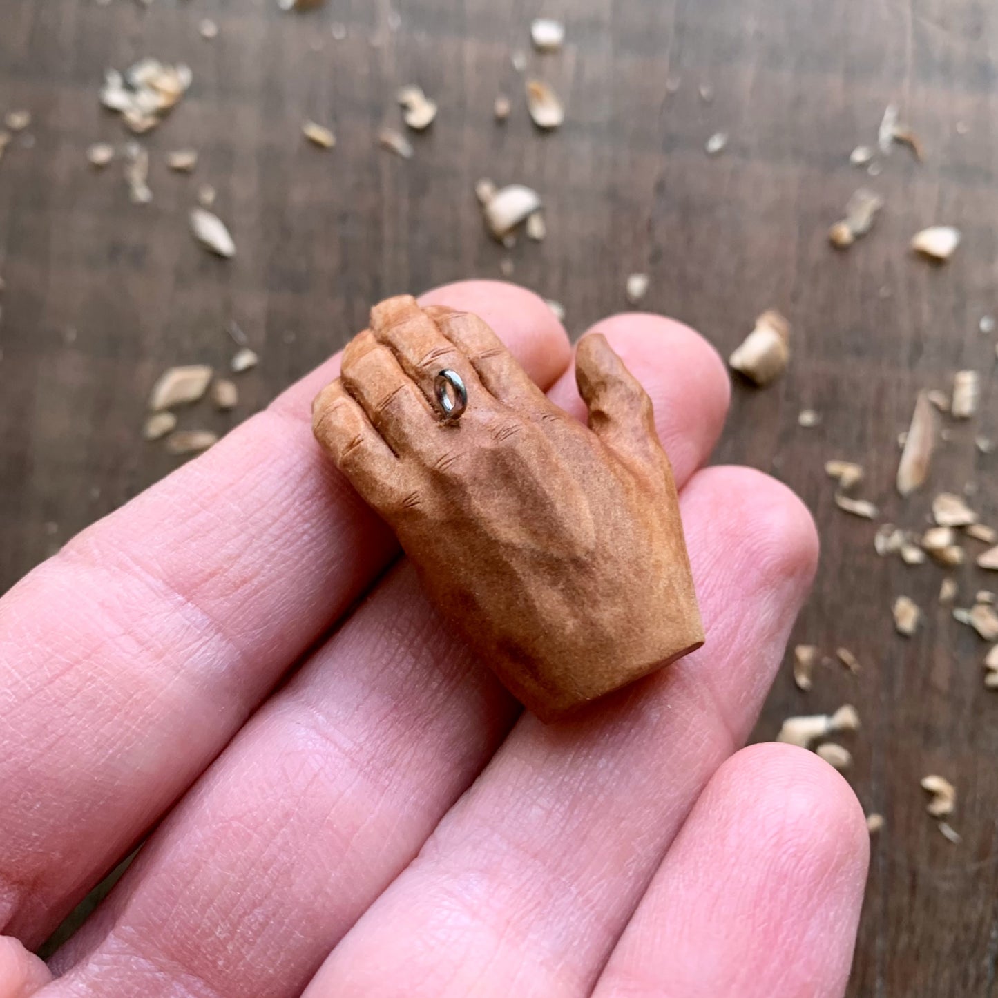 Hand with olive tree branch