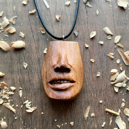 Biting Lips Pendant