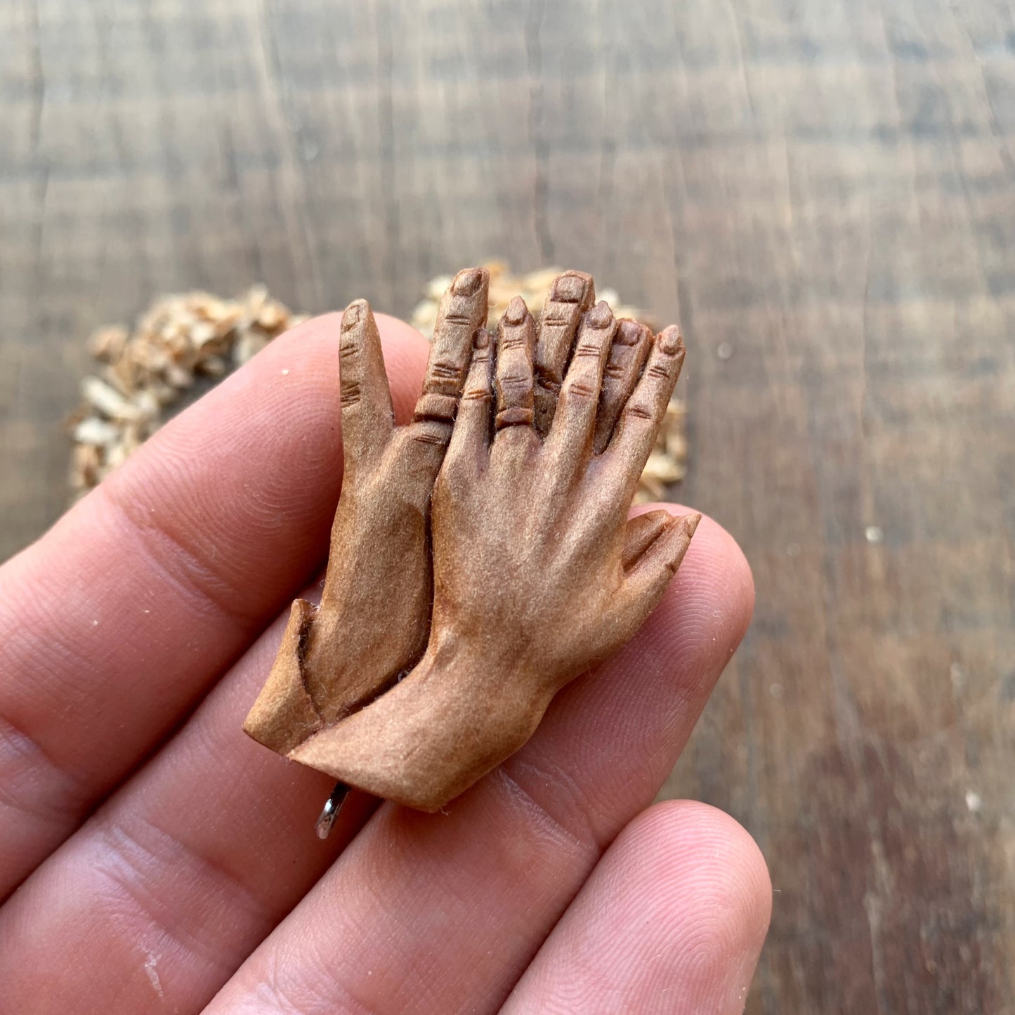 “Braided Hands” Pear Wood Pendant