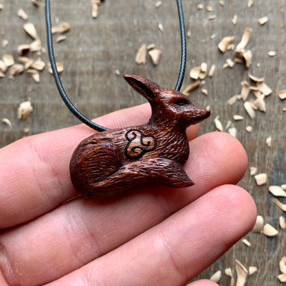 Hand Carved Fox Triskelion Pendant