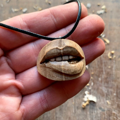 Biting Lips Walnut Wood Pendant