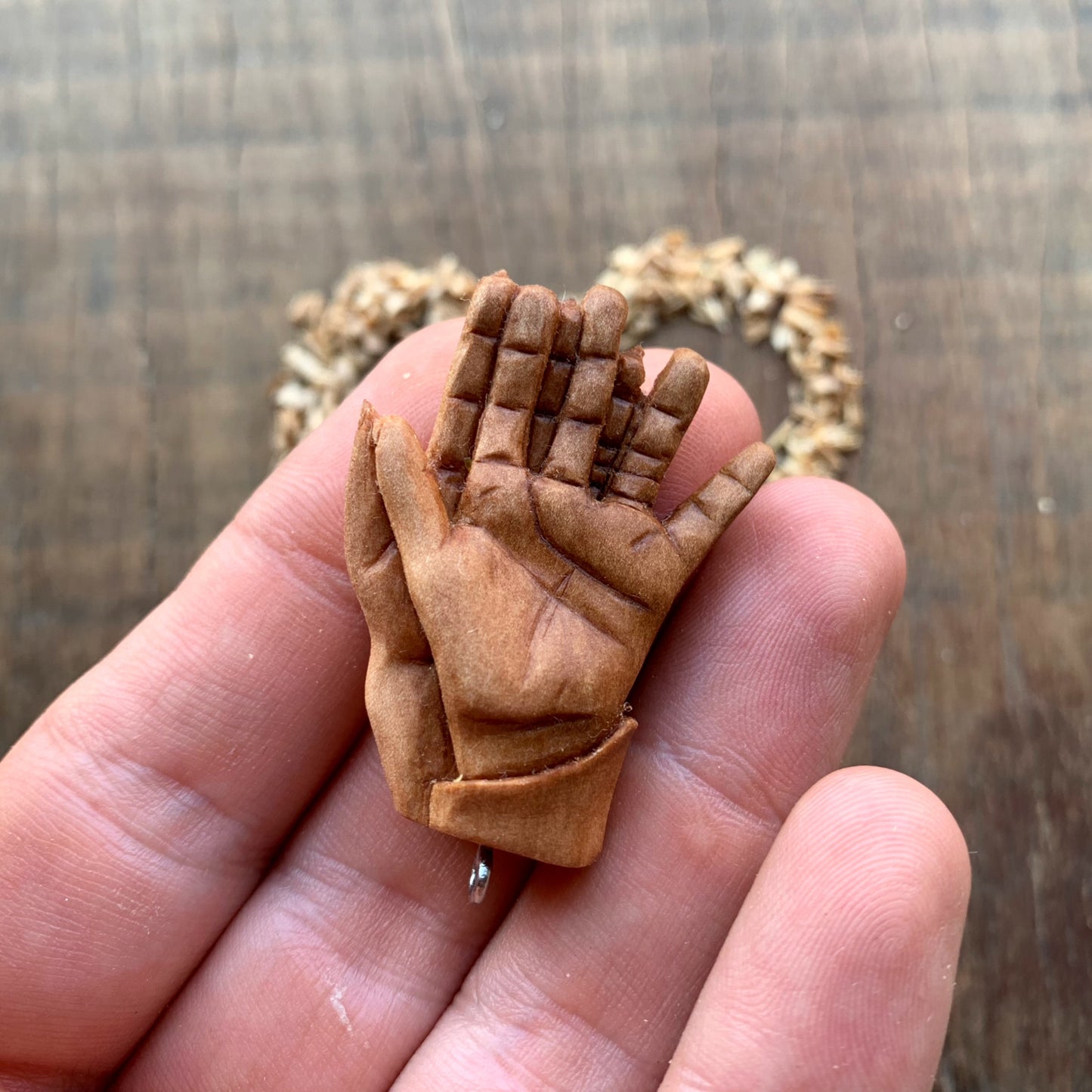 “Braided Hands” Pear Wood Pendant