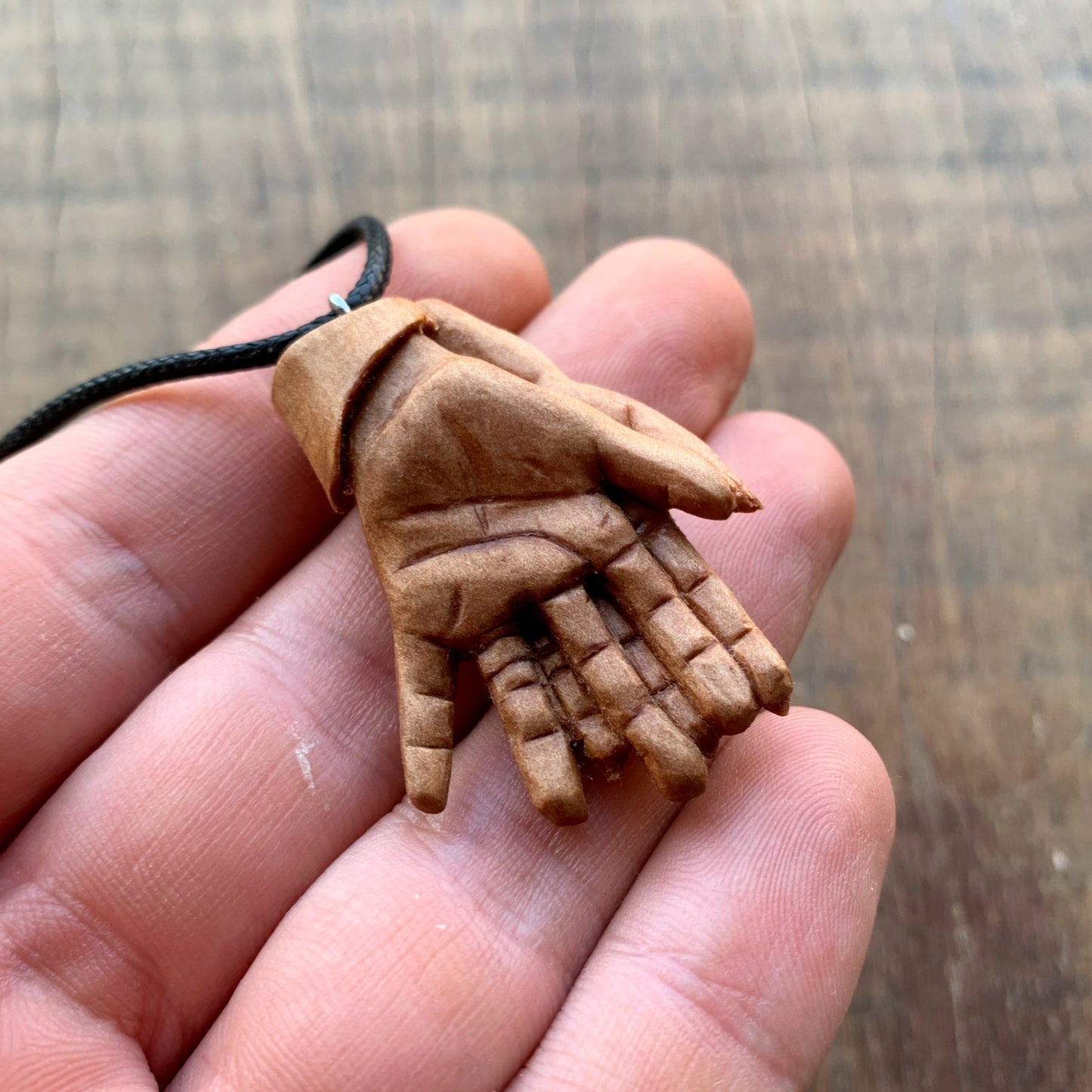 “Braided Hands” Pear Wood Pendant