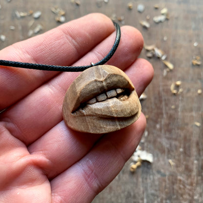 Biting Lips Walnut Wood Pendant