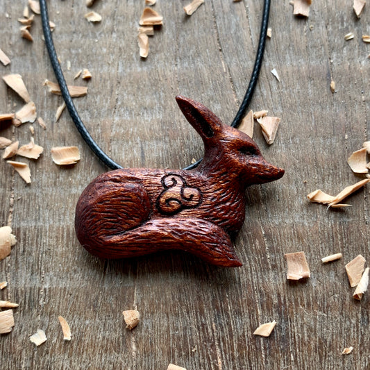 Hand Carved Fox Triskelion Pendant