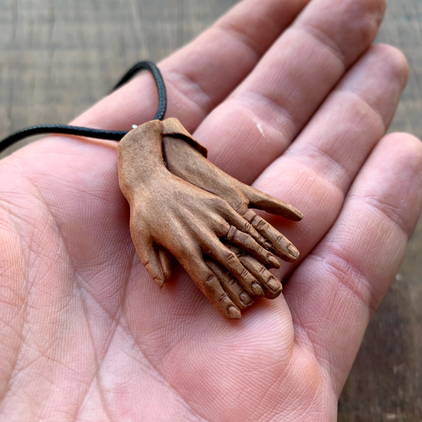 “Braided Hands” Pear Wood Pendant