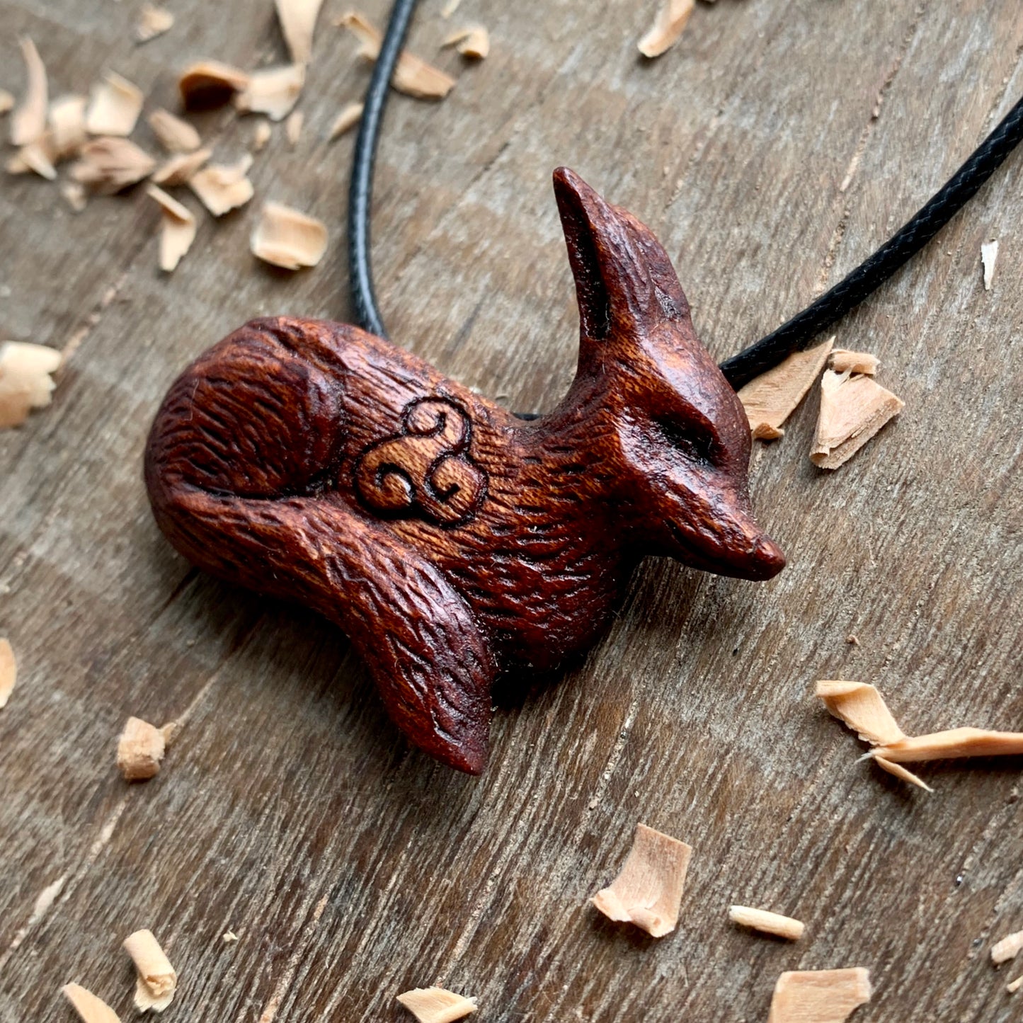 Hand Carved Fox Triskelion Pendant